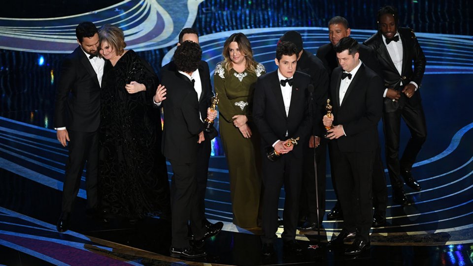 crew of spider man into the spider verse accepts the animated feature film award during the 91st annual academy awards oscars 2019 getty h 2019 